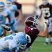 Skyline senior Theron Wilson tackles Dexter senior Jay Lewis breaking up a pass attempt during the first half against Dexter at Dexter on Friday night.